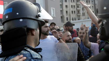 Lebanese security forces intervene to seperate between demonstrators and counter-protesters in the centre of the capital Beirut during the 13th day of anti-government protests on October 29, 2019. (AFP)