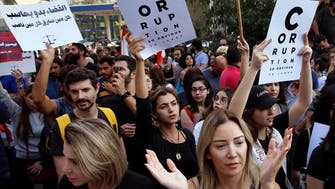 Day 21 of protests in Lebanon with banks, roads shut 