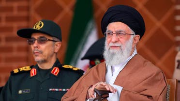 In this picture released by an official website of the office of the Iranian supreme leader, Supreme Leader Ayatollah Ali Khamenei, right, reviews armed forces with Chief of the General Staff of the Armed Forces Gen. Mohammad Hossein Bagheri, during a graduation ceremony at Iran's Air Defense Academy, in Tehran, Iran, Wednesday, Oct. 30, 2019. (AP)