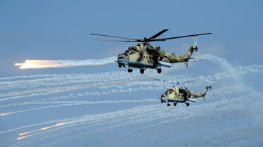 Russian Mi-35 helicopters fire during military exercises in Dagestan, 2019 - Reuters