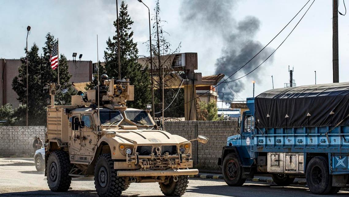 A US military armored vehicle drives in a patrol past an oil well in Rumaylan (Rmeilan) in Syria's northeastern Hasakeh province on November 6, 2019. (AFP)