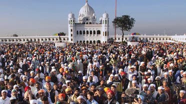 Sikh pilgrims visit the shrine of their spiritual leader Guru Nanak Dev, at Gurdwara Darbar Sahib in Kartarpur, Pakistan. (AP)