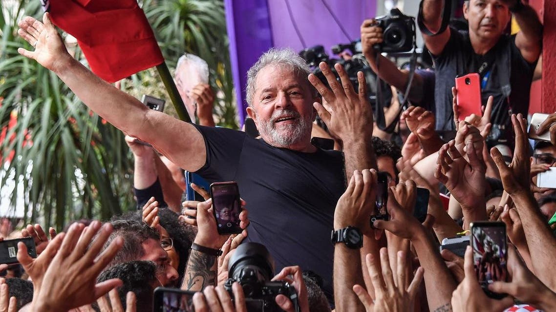 Brazilian former president (2003-2011) Luiz Inacio Lula da Silva waves at supporters gathering outside the metalworkers' union building in Sao Bernardo do Campo, in metropolitan Sao Paulo, Brazil, on November 9, 2019. (AFP)