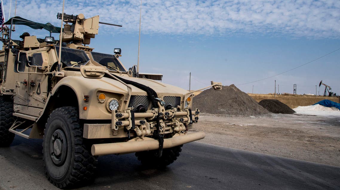 In this Monday, Oct. 28, 2019 file photo, U.S. forces patrol Syrian oil fields, in eastern Syria. (AP)