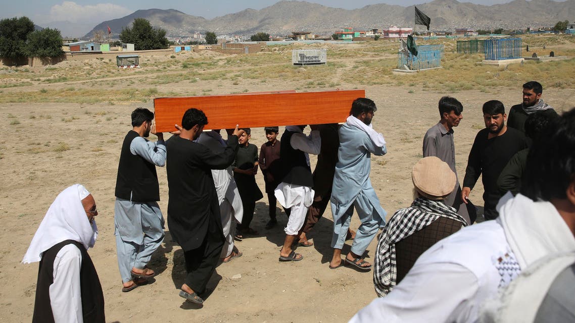 Afghans carry the body of a victim of Dubai City wedding hall bombing during a mass funeral in Kabul, Afghanistan, Sunday, Aug.18, 2019. The deadly bombing at the wedding in Afghanistan's capital (AP)