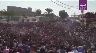 Thousands of protesters march in funeral held for dissident poet in Ahwaz