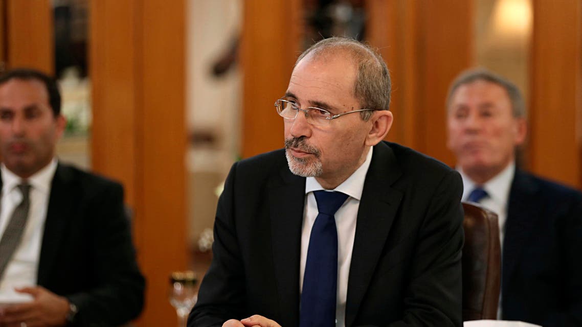 Jordanian Foreign Minister Ayman Safadi, center, attends a meeting with his Iraqi and Egyptian counterparts at the Ministry of Foreign Affairs in Baghdad, Iraq, Sunday, Aug. 4, 2019. (AP Photo)