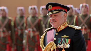 Jordan's King Abdullah II, reviews an honor guard before giving a speech to Parliament in Amman, Jordan, Sunday, Nov. 10, 2019. (AP)
