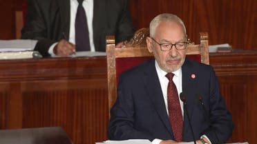 Tunisian Ennahdha party leader Rached Ghannouchi (R) chairs the first session of the new parliament following the October elections in the capital Tunis, on November 13, 2019. (AFP)