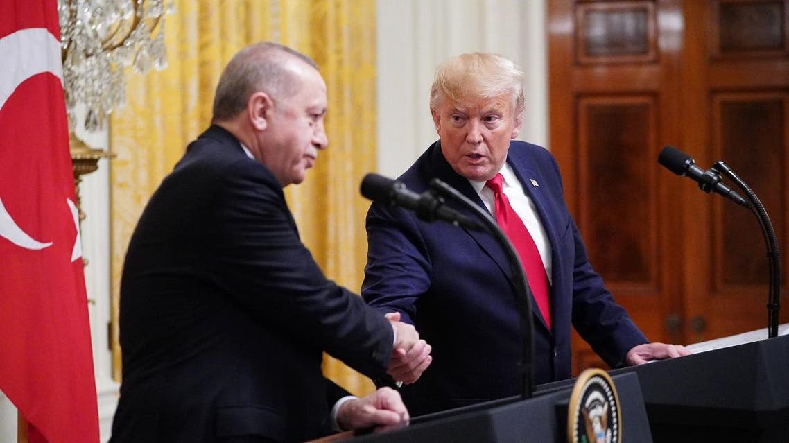 US President Donald Trump and Turkey's President Recep Tayyip Erdogan (L) take part in a joint press conference in the East Room of the White House in Washington, DC on November 13, 2019. (AFP)
