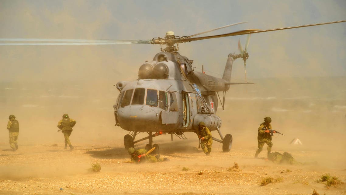 Russian marines disembark from a helicopter during military exercises in Dagestan (Reuters)