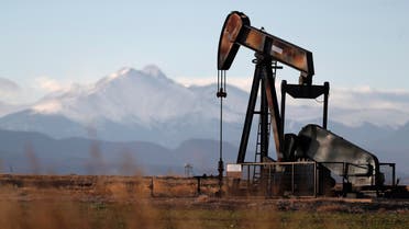 This Dec. 22, 2018, file photo shows a pump jack over an oil well along Interstate 25 near Dacono, Colorado (AP)