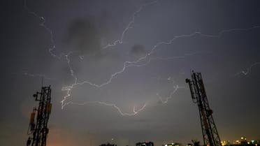 Lightning strikes over the Pakistan's port city of Karachi during a thunderstorm early on August 22, 2017. (AFP)