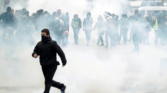 Paris police fire tear gas on ‘yellow vest’ protests anniversary