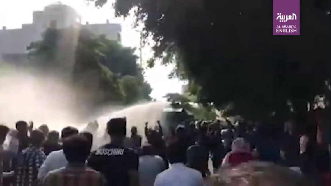 Security forces fire water cannons at protesters in Iran's Bushehr, Nov. 16, 2019. (Screengrab)