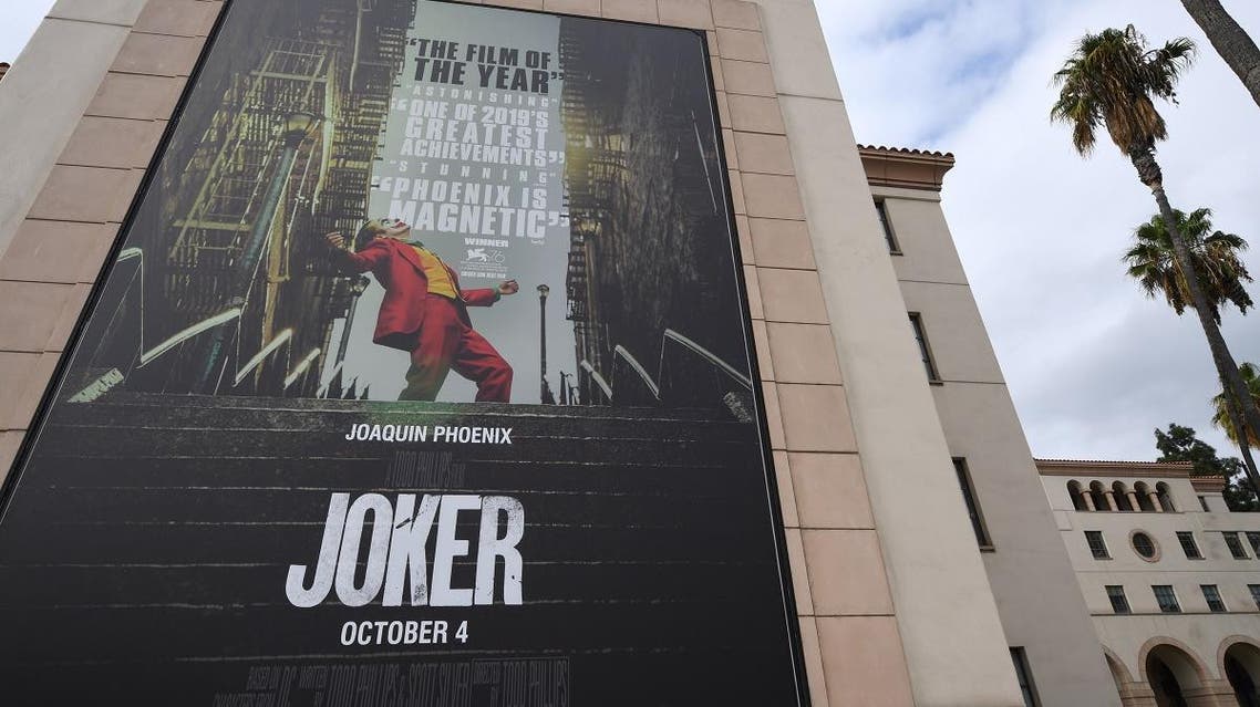 A poster for the upcoming film "The Joker" is seen outside Warner Brothers Studios in Burbank, California. (Reuters)