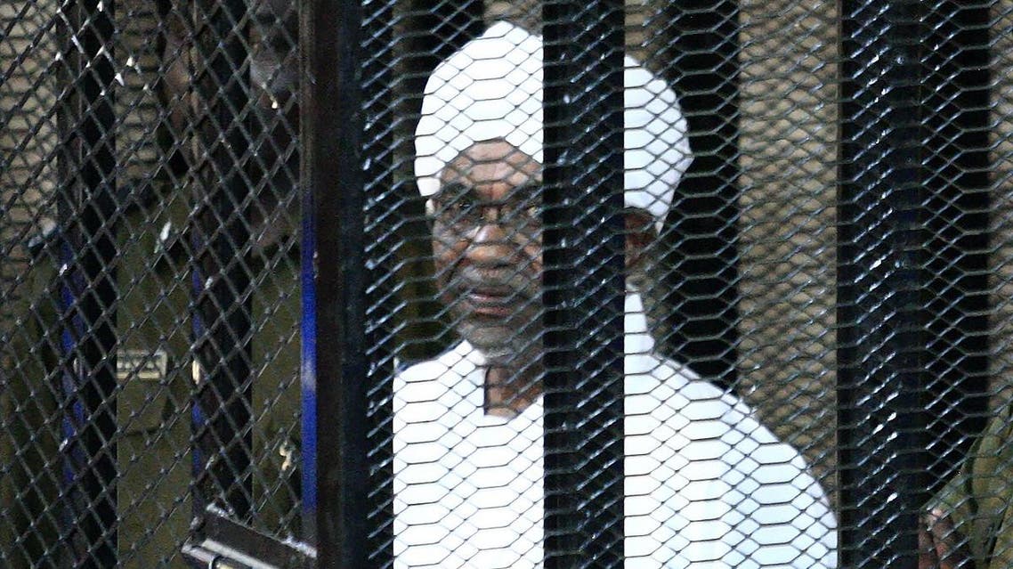 Sudan's ex-president Omar al-Bashir appears in court in the capital Khartoum on August 31, 2019 to face charges of illegal acquisition and use of foreign funds. (AFP)