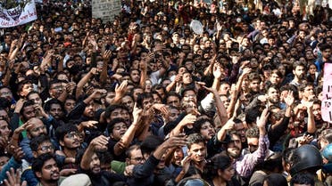 Jawaharlal Nehru University (JNU) students shout slogans as they protest against accommodation fee hike in New Delhi on November 18, 2019. (AFP)