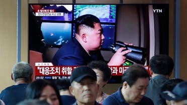 People watch a TV showing a file image of North Korean leader Kim Jong Un during a news program at the Seoul Railway Station in Seoul, South Korea, Tuesday, Aug. 6, 2019. (AP)