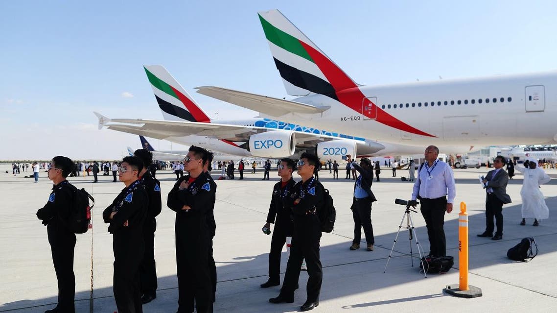 Visitors watch the air display performance during the first day of Dubai Air Show in Dubai, UAE, on November 17, 2019. (Reuters)/