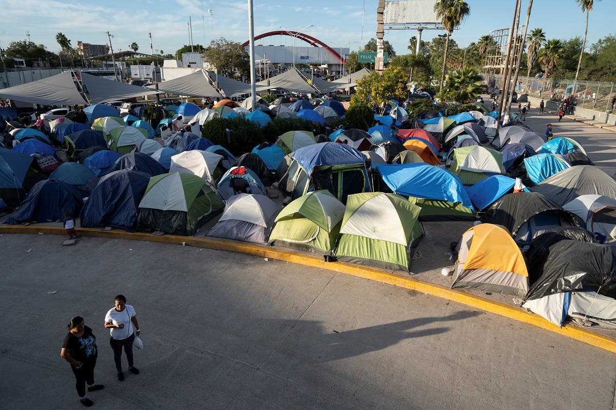 View of a migrants’ camp on the Mexican border just south of the Rio Grande, in Matamoros, Tamaulipas state, Mexico, near to the border with the United States, on November 1, 2019. (AFP)
