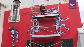 Yemeni street artist unveils Paris mural to highlight