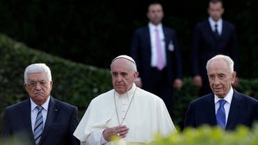  In this June 8, 2014 file photo, Pope Francis is flanked by Israel's President Shimon Peres, right, and Palestinian President Mahmoud Abbas during an evening of peace prayers in the Vatican gardens. (AP)