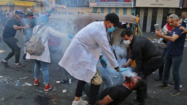 بغداد.. اشتباكات عنيفة بين المتظاهرين والأمن