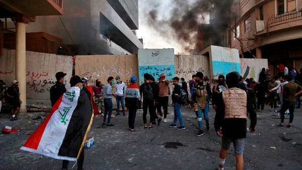 صدامات وذخيرة حية ضد المحتجين وسط بغداد والقتلى بارتفاع