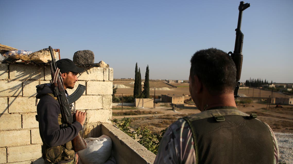 AFP Turkey backed Syrian fighters hold a position in the village of al Yalishli in the countryside of Manbij November 1 2019