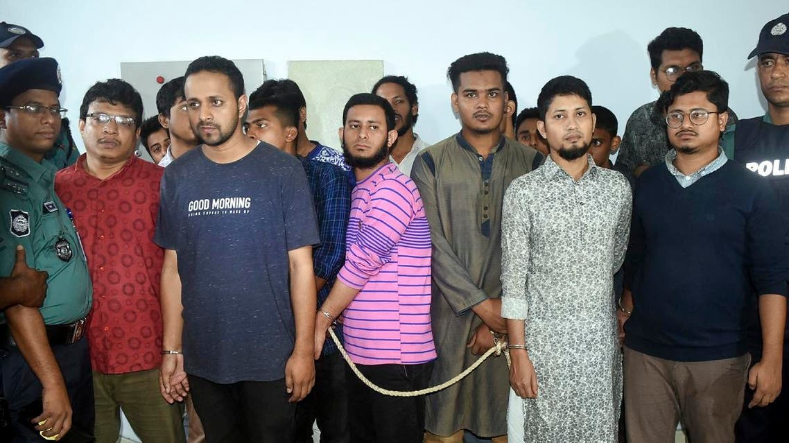 Convicted Islamist militant stand as they are escorted by Bangladesh police in Chittagong on November 23, 2019. (AFP)