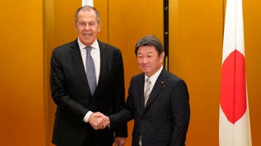 Japanese Foreign Minister Toshimitsu Motegi (R) shakes hands with Russian Foreign Minister Sergey Lavrov at the start of a bilateral meeting ahead the G20 Foreign Ministers' meeting in Nagoya on November 22, 2019. FRANCK ROBICHON / POOL / AFP