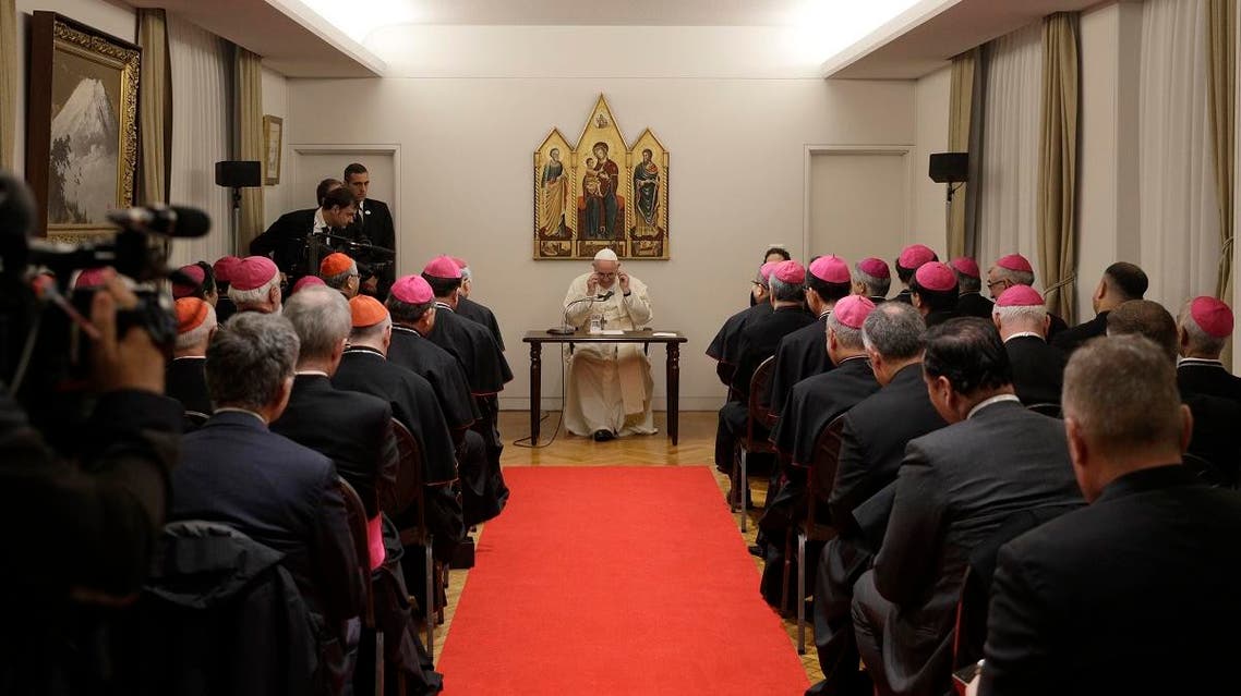 Pope Francis adjusts his glasses as he meets with Bishops at the Apostolic Nunciature in Tokyo, Saturday, Nov. 23, 2019. (AP)
