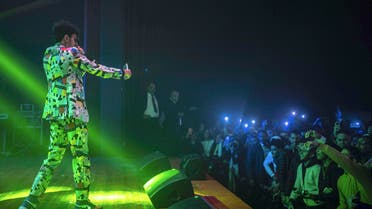In this Friday, Nov. 22, 2019 photo, Moroccan rapper Abdelkrim Bouhjir, known as Kouz1, performs at a rap concert as part of the Visa for Music festival in Rabat, Morocco. (AP PhotoMosa'ab Elshamy)