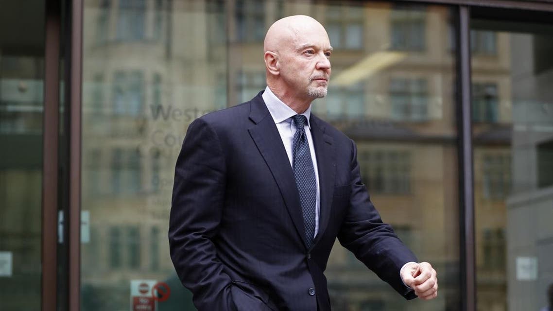 Former Barclays head of investment banking and investment management in the Middle East, Roger Jenkins, leaves after an appearance at Westminster Magistrates Court in central London on July 3, 2017. (AFP)
