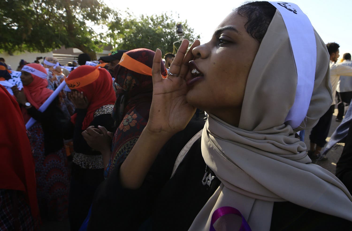 Sudanese women march in Khartoum to mark International Day for Eliminating Violence against Women. (AFP)