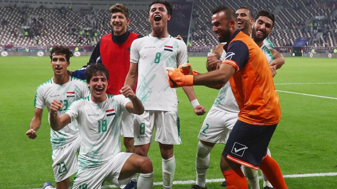 Iraqi players celebrate after their win against Qatar in the Gulf Cup Group A match at Khalifa International Stadium, Doha, Qatar, on November 26, 2019. (Reuters)