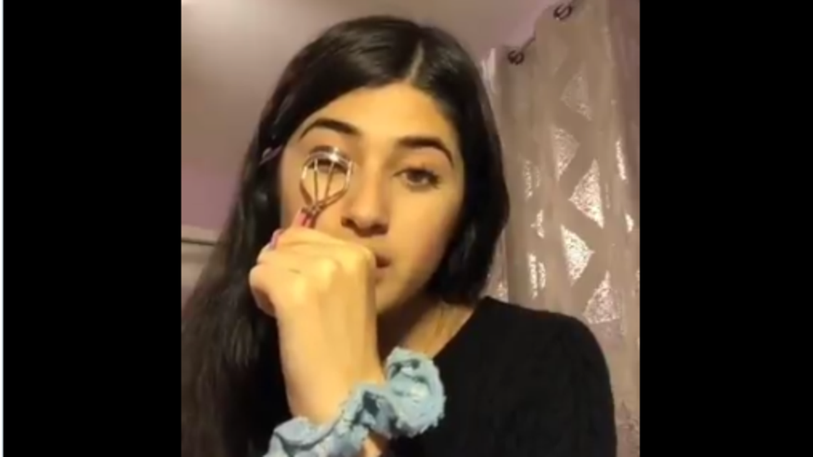 A TikTok post by a young woman, pretending to give eyelash curling advice while actually condemning China’s crackdown on Muslims in Xinjiang, has gone viral. (Screengrab)