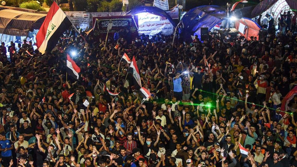 Iraqi protesters gather during a late anti-government demonstration in Nasiriyah, the capital of the southern province of Dhi Qar on November 4, 2019. AFP