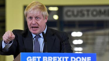 Britain's Prime Minister Boris Johnson delivers a speech during his Conservative party general election campaign visit to the London Electric Vehicle Company (LEVC) in Coventry. (AFP)