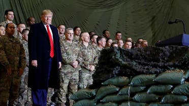 US President Donald Trump delivers remarks to US troops in an unannounced visit to Bagram Air Base, Afghanistan. (Reuters)