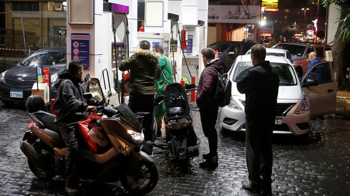 People wait to get fuel for their vehicles at a petrol station, in Beirut, Lebanon, on November 27, 2019. (Reuters)