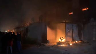 Iraqi protesters burn down Iranian consulate in Najaf