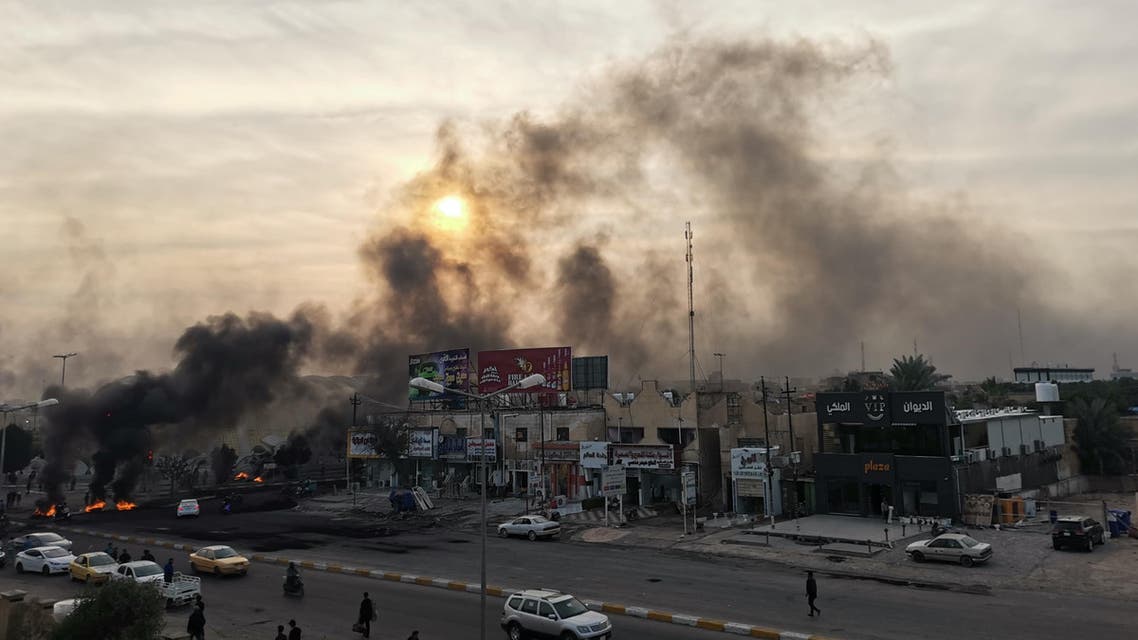 nasiriyah smoke from protests in Iraq November 25 - AFP