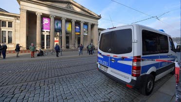 Police car parks outside Green Vault city palace after a robery in Dresden. (Reuters)