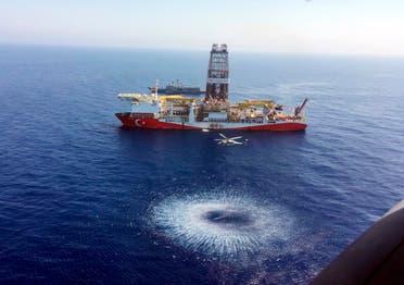 In this July 9, 2019 photo, a helicopter flies over Turkey’s drilling ship, ‘Fatih’ dispatched towards the eastern Mediterranean, near Cyprus. (AP)