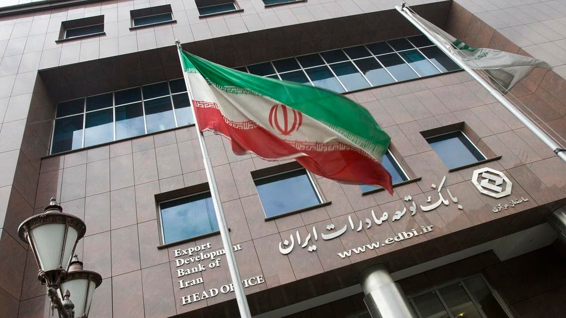 An Iranian flag flutters in front of the head office of the Export Development Bank of Iran (EDBI) in Tehran November 9, 2008. (Reuters)