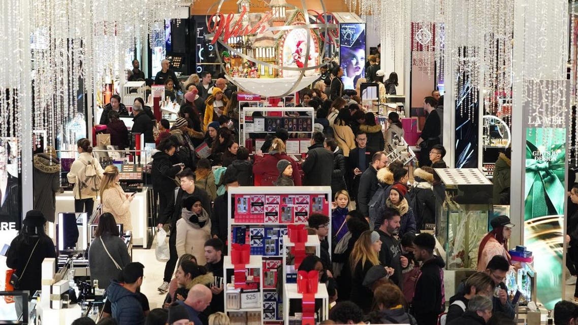 Consumers begin their Black Friday specials shopping as Macy’s opens their doors at 5pm on Thanksgiving Day on November 28, 2019 in New York. (AFP)