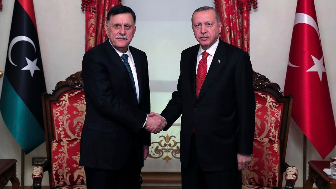 Turkey's President Recep Tayyip Erdogan, right, shakes hands with Fayez al Sarraj, left, the head of Libya's internationaly-recognized government, prior to their meeting in Istanbul, Wednesday, Nov. 27, 2019. (AP)
