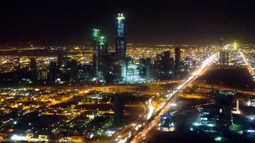 The skyline of Riyadh, Saudi Arabia, March 28, 2014, is seen at night in this aerial photograph from a helicopter. AFP PHOTO / Saul LOEB SAUL LOEB / AFP